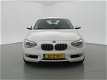 BMW 1-serie - 114i EDE URBAN WIT PARELMOER 5-DEURS *84.826 KM - 1 - Thumbnail