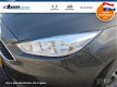 Ford Focus Wagon - 1.0 AIRCO/NAVI/PDC ACHTER/ 1e eigenaar - 1 - Thumbnail