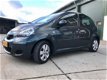 Toyota Aygo - 1.0-12V Aspiration Green Navigator - 1 - Thumbnail