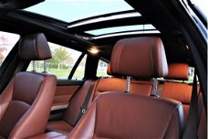 BMW 3-serie Touring - 325d 3.0 High Executive Panoramadak Sportleer M-velgen 18"