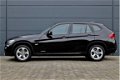 BMW X1 - XDrive20i Business (NAVIGATIE, CLIMA, PDC, LM VELGEN, CRUISE, DEALER ONDERHOUDEN, STUUR BE - 1 - Thumbnail