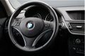 BMW X1 - XDrive20i Business (NAVIGATIE, CLIMA, PDC, LM VELGEN, CRUISE, DEALER ONDERHOUDEN, STUUR BE - 1 - Thumbnail