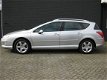 Peugeot 407 SW - 2.0 ST Pack Business Intro autm:/navig:/cruis:/trekh:/airc - 1 - Thumbnail