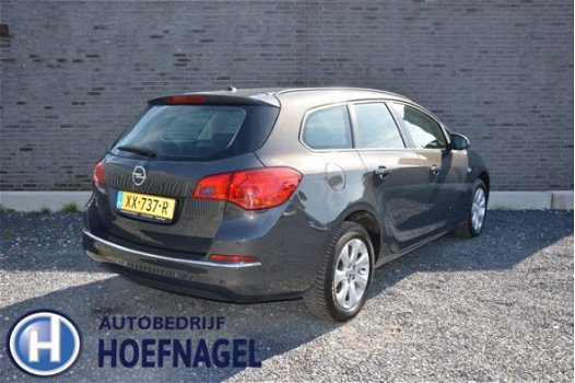 Opel Astra Sports Tourer - 1.6 Turbo Design Edition Airco, cruise, PDC achter, LM 16'' - 1