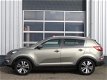 Kia Sportage - 2.0 X-clusive 4wd *AUTOMAAT/TREKHAAK - 1 - Thumbnail