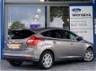 Ford Focus - 1.0 EcoBoost Titanium | Wegklapbare trekhaak | Climate Control | Voorruitverwarming | P - 1 - Thumbnail