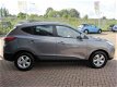 Hyundai ix35 - 1.6i GDI Active*AIRCO*NAVIGATIE*CRUISE CONTROL* ACHTERUITRIJCAMERA*LM 16