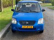 Suzuki Wagon R+ - 1.3 GA goedrijdende nette wagon r met nap nieuwe apk - 1 - Thumbnail