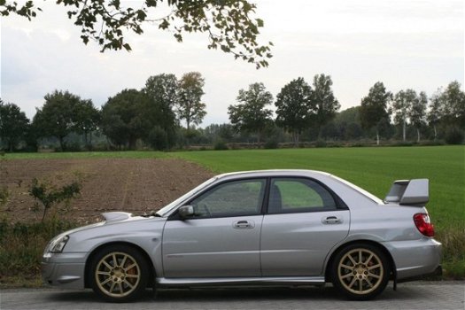 Subaru Impreza - 2.0 WRX AWD STi DCCD - 1