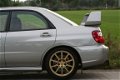 Subaru Impreza - 2.0 WRX AWD STi DCCD - 1 - Thumbnail