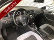 Volkswagen Jetta - 1.4 TSI DSG 122 PK HIGHL NAVI PDC VA CLIMA ENZ - 1 - Thumbnail