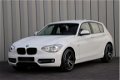 BMW 1-serie - 116i Aut8 Sport 5 Drs Clima Navi Pdc Stoelverw. Led-Xenon 2014 - 1 - Thumbnail