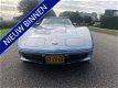 Chevrolet Corvette - USA 1 YZ 87 nederlands nieuw geleverd door pieterse - 1 - Thumbnail