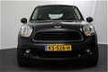 Mini Mini Countryman - 1.6 One Champ Edition (Airco/Blue tooth/LMV/Stoelverwarming/ navigatie) - 1 - Thumbnail