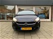 Opel Corsa - 1.0 Turbo 120 Jaar Edition € 3.520, - korting - 1 - Thumbnail