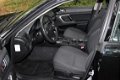 Subaru Legacy Touring Wagon - Automaat 2.0R Comfort, Airco/ECC, trekhaak - 1 - Thumbnail