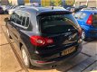 Volkswagen Tiguan - 1.4 TSI Sport&Style Bj.2009 / Navi / PDC v & a - 1 - Thumbnail