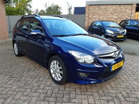 Hyundai i30 CW - I30cw 1.4i CVVT Blue i-drive Airco Navi NL-auto Afn. haak - 1