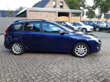 Hyundai i30 CW - I30cw 1.4i CVVT Blue i-drive Airco Navi NL-auto Afn. haak - 1