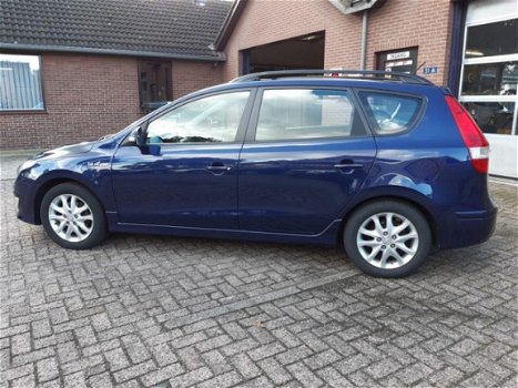 Hyundai i30 CW - I30cw 1.4i CVVT Blue i-drive Airco Navi NL-auto Afn. haak - 1