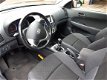 Hyundai i30 CW - I30cw 1.4i CVVT Blue i-drive Airco Navi NL-auto Afn. haak - 1 - Thumbnail