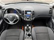 Hyundai i30 CW - I30cw 1.4i CVVT Blue i-drive Airco Navi NL-auto Afn. haak - 1 - Thumbnail