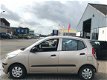 Hyundai i10 - 1.1 Active Cool Airco/ El. raam/ NAP/ APK - 1 - Thumbnail