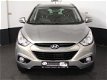 Hyundai ix35 - 2.0I STYLE 1E EIG.KEYLESS/CRUISE./PARK./TREKHAAK - 1 - Thumbnail