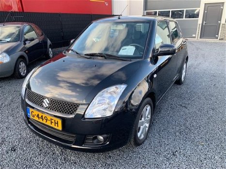 Suzuki Swift - 1.3 Comfort MET AIRCO EN ELEKTRISCHE RAMEN - 1