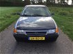 Opel Astra - 1.6i Young Warm en Droog Goed rijden - 1 - Thumbnail