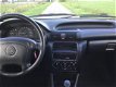 Opel Astra - 1.6i Young Warm en Droog Goed rijden - 1 - Thumbnail