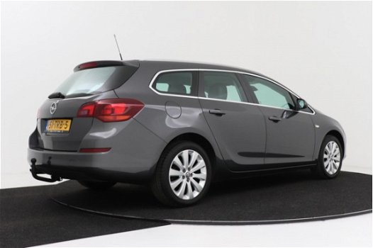 Opel Astra Sports Tourer - 1.4 Turbo Cosmo | Half leer | Parkeersensoren | Trekhaak - 1