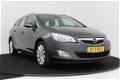 Opel Astra Sports Tourer - 1.4 Turbo Cosmo | Half leer | Parkeersensoren | Trekhaak - 1 - Thumbnail