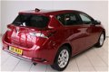 Toyota Auris - 1.2T Dynamic | Panoramadak | Cruise control | Navigatie | Climate control | Lm velgen - 1 - Thumbnail