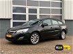Opel Astra Sports Tourer - 1.4 Turbo Navigatie/PDC/Half leder - 1 - Thumbnail