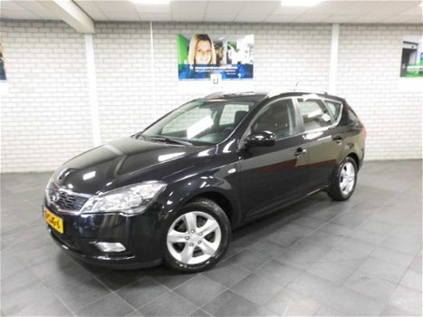 Kia Cee'd - 1.4 CVVT SEVEN, NAVIGATIE, BLUETOOTH, CRUISECONTROL, VELGEN RIJKLAARPRIJS - 1