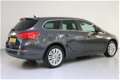 Opel Astra Sports Tourer - 1.4 Turbo Design Edition + Navigatie - 1 - Thumbnail