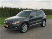 Volkswagen Tiguan - 1.4 TSI Sport&Style | Panoramadak | Park.Sensoren | 77000km - 1 - Thumbnail