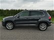 Volkswagen Tiguan - 1.4 TSI Sport&Style | Panoramadak | Park.Sensoren | 77000km - 1 - Thumbnail