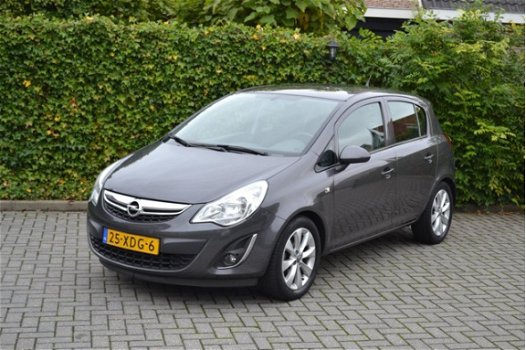 Opel Corsa - 1.4-16V Cosmo 100PK Airco L.M.velgen Cruise controle NAP - 1