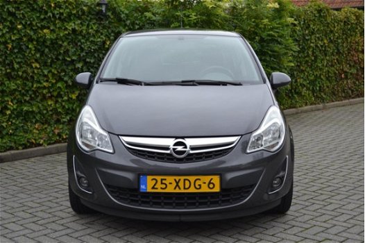 Opel Corsa - 1.4-16V Cosmo 100PK Airco L.M.velgen Cruise controle NAP - 1