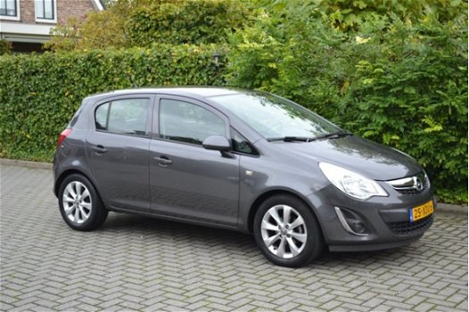 Opel Corsa - 1.4-16V Cosmo 100PK Airco L.M.velgen Cruise controle NAP - 1