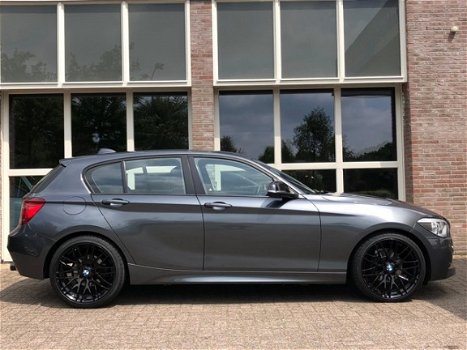 BMW 1-serie - 116i Business+ |M-pakket|Breyton velgen|Groot Navi|Leder - 1