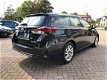 Toyota Auris Touring Sports - 1.3 Aspiration Luxe / Xenon / Cruise ctr / Climate ctr / Navi / Camera - 1 - Thumbnail