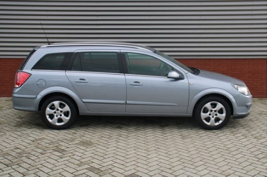 Opel Astra Wagon - 1.6 Elegance 105 PK Automatische airco Cruise Half leer LMV Trekhaak Top onderhou - 1