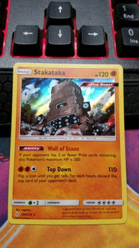 Stakataka 106/214 Holo sm Unbroken Bonds - 1