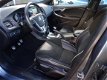 Volvo V40 - 2.0 D4 190pk R-Design Navi, Cruise Cntrl, PDC achter - 1 - Thumbnail