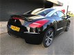 Peugeot RCZ - 1.6 THP Red Carbon Dealeronderhouden - 1 - Thumbnail