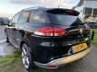 Renault Clio Estate - 1.2 GT 120Pk AUTOMAAT Climat R-Link PDC 17'LMV Keyless - 1 - Thumbnail