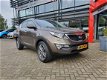 Kia Sportage - 2.0 163PK XENON / NAV / LM / PDC / CLIMA - 1 - Thumbnail